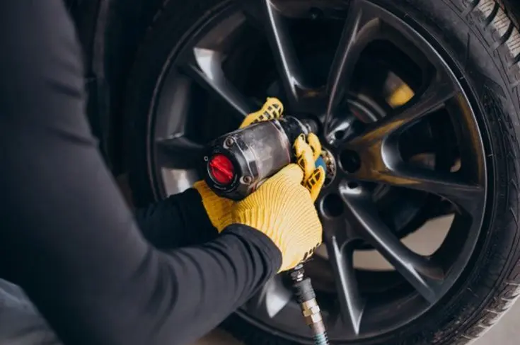 Before and after alloy wheel straightening showing repaired wheel