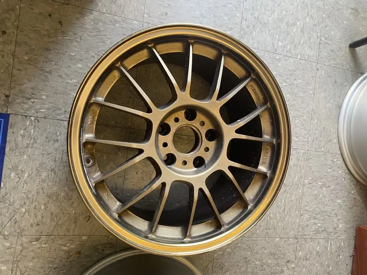 Close-up of alloy wheel after powder coating with smooth finish